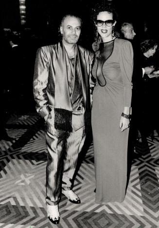 Below, designer Stephan Caras and his wife, Sharida, both in Caras designs