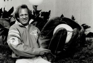 True blue fan. Designer Roger Edwards models the Blue Jays Jacket he designed for Shain of Canada. The Jacket, with raised Jays logos on the breast an(...)