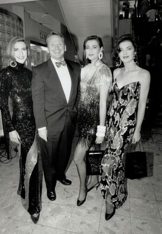 Mackie and company. American couturier Bob Mackie, with models wearing his glamorous gowns, was in town last week to promote his new fragrance and meet fans at The Bay on Queen
