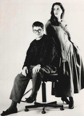 Sophisticated style: Above,. Toronto designer Paul Milana, 23, with model wearing his silk and cotton blend suit with long, full skirt and boxy jacket(...)