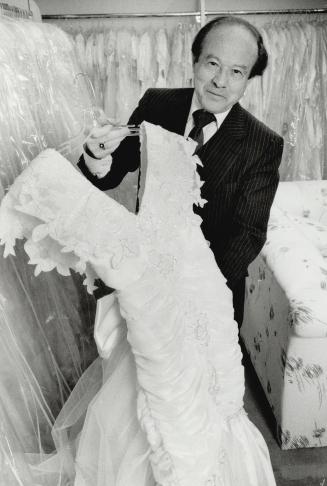 Bridal couturier: Jack Ritche has been designing wedding gowns for Metro brides since the '50s and says he's noticed a decrease in demand for traditional bridal wear