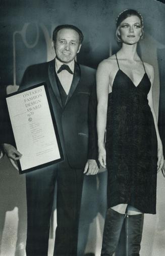 Best of show award for women's fashions was won by designer Eugene Schonberger (left) for midi evening dress of black broadtail fur