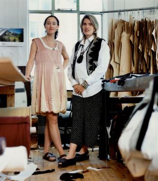 Above left, designer Lorren Boy wears Bent Boys' Chinese silk Dagwood dress, right, Brenda Bent wears a man's white shirt, Bent Boys' printed pants and embroidered bolero from Courage My Love