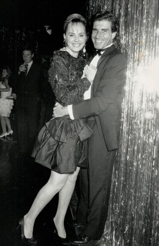 Class act: Above, designer Romona Keveza and fiance Pingu Zamudio