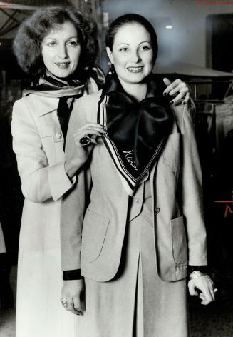 Dressing Know-How, Fashion expert Evelyn Kuneman (left) shows Wendy Clark how to tie scarf with flair