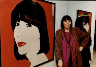 Below, Mariuccia Mandelli stands beside a portrait of herself by Andy Warhol during her visit to Toronto