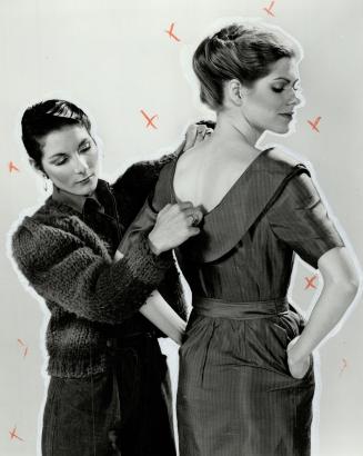 Slim bodice: Designer Kim Myles, below, checks fit of one of her creation - a double-breasted, lapel-collared dress with peg-shaped skirt, in Italian cotton