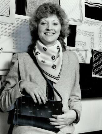 Woman's touch: Designer Sheri Turner sports some of Eugene's fashions for females