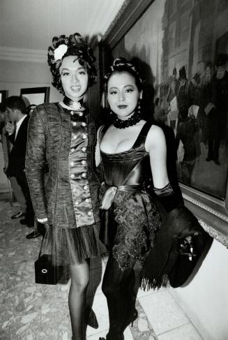 Right, Ports designer Miki Tanabe in Vivienne Westwood bustier and lace apron skirt, with Fujiko in tulle ballerina dress