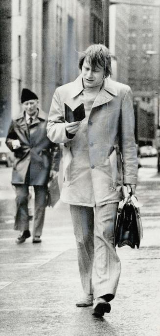 On his 77th attempt to get a job ? which was successful ? 27-year-old Duncan Day walks through downtown Toronto yesterday. He came to Canada from Engl(...)