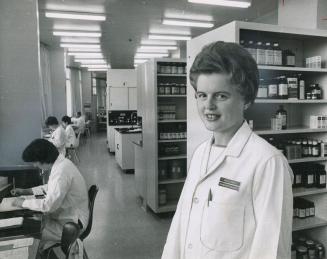 Pharmacist Muriel Hale, shown here in the Riverdale Hospital pharmacy where she's the director, had to go to university for a year (taking courses par(...)