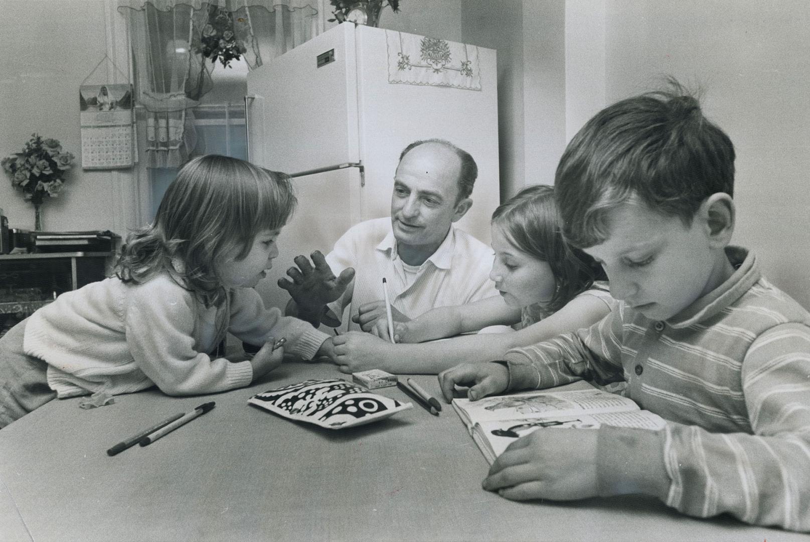 This is my home now, says Nazzareno Trelle as he watches two of his children, Gina, 10, and Domenic, 9, do their homework in the kitchen of his Toront(...)