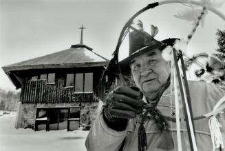 Domenic Eshkakogan, 59, holds a native medicine wheel at Anishinabe Spiritual Centre near Espanoia