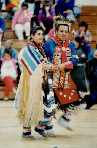 Sharing: Sherman and Becky Butier dance at Georgina's first powwow at opening of First Nations Study centre at Sutton District High School