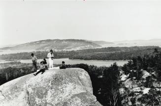 Wilderness Altar: On dreamer's rock, a giant quartz altar where people fast and seek visions, band lands manager Esther Jacko delivers a sermon on preserving the land