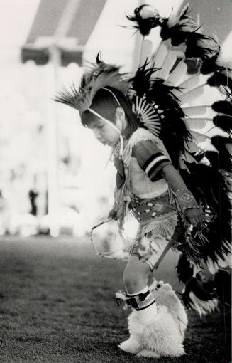 Weekend Powwow: Nigel Schuyler, 6, of Detroit dances on the Toronto Islands in a native celebration