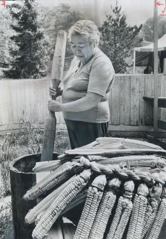 The way it was, Marjorie Skye, from the Six Nations Reserve in Brantford, grinds corn in the Native Heritage show now opened at the Ontario Science Ce(...)