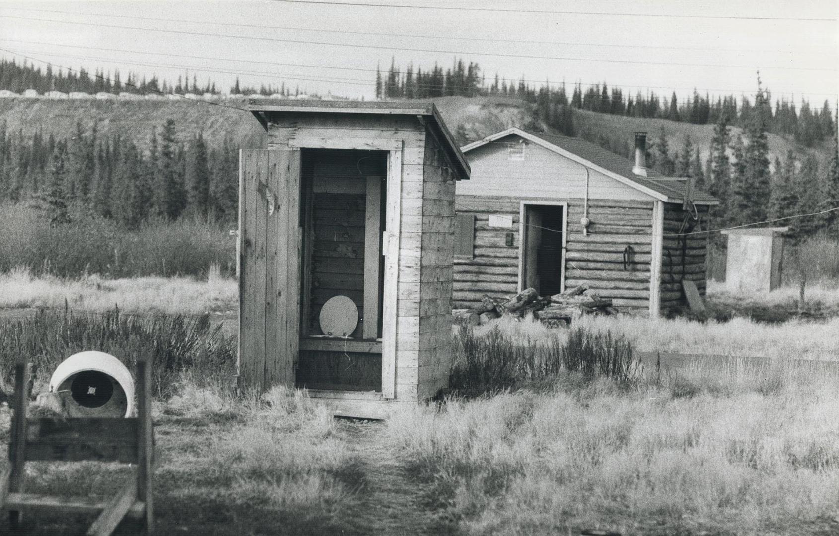 Outside shot in Indian Village, with outside Toilet and All