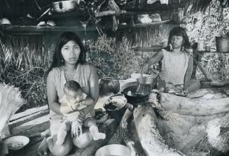 Once proud hunters, Paraguay's displaced Toba-Maskoy Indians now live in scrapwood shacks and depend on government food shipments