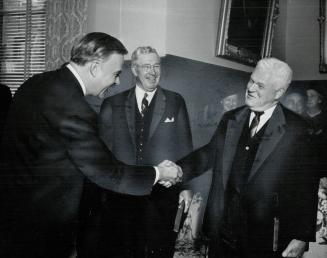 Ontario's New Chief Justices, Premier John Robarts (left) congratulates two new chief justices of Ontario, Chief Justice George Gale, 61, chief justic(...)