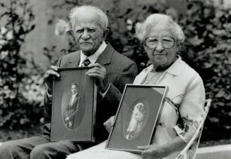 Together forever: Baycrest residents Jack Ashwrow, 94, and his wife Ida, 95, display their wedding photographs, taken in 1922 in Toronto