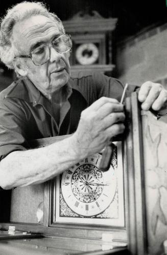Retirement hobby: Sixty-eight-year-old retired mechanical engineer Albert Allen can spend up to 250 hours completing his finely detailed wooden clock cabinets