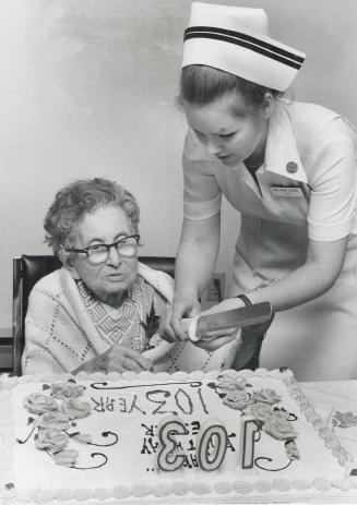 A Cake for 103 years, A wine-and-cheese party and a huge cake marked, Esther Cohen's 103rd birthday yesterday at Lincoln Place Nursing Home on Walmer (...)