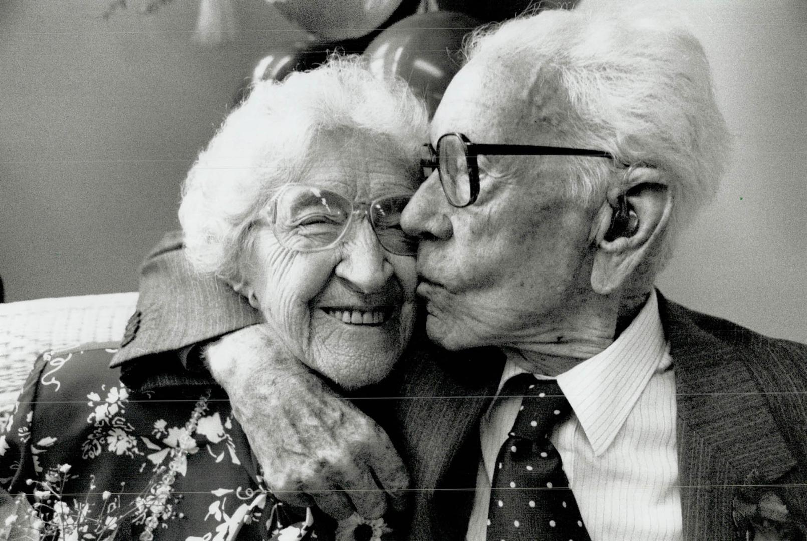 Birthday kiss for sis, Edna Carely, who turned 100 yesterday, gets a birthday kiss her kid brother Olli, 98, Edna, who lives in Fellowship Towers, a T(...)