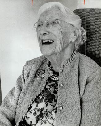 A happy 100-year-old, Margaret Foulds enjoys a laugh at Shepherd Lodge, where she celebrated her birthday yesterday