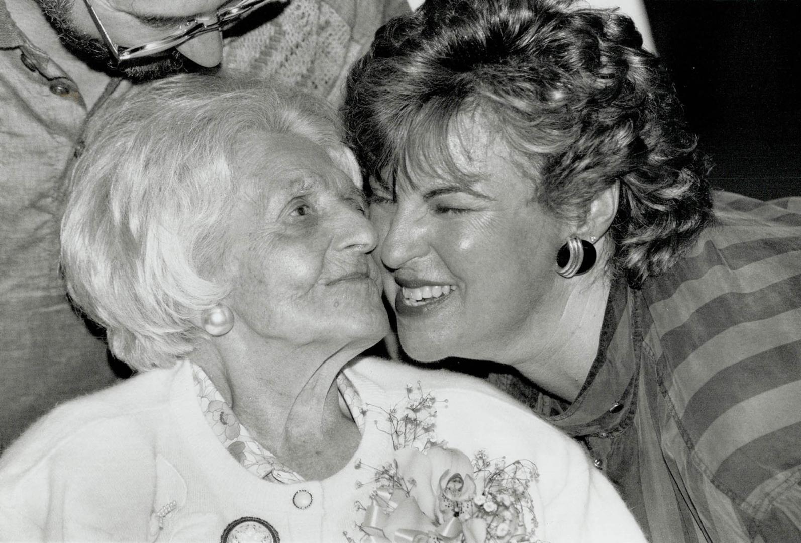 A century of living, Bella Goldmacher receives a warm hug at the Baycrest Centre on her 100th birthday yesterday from her granddaughter Doreen Litowit(...)