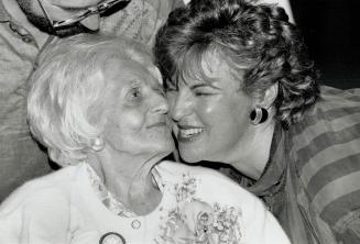 A century of living, Bella Goldmacher receives a warm hug at the Baycrest Centre on her 100th birthday yesterday from her granddaughter Doreen Litowit(...)