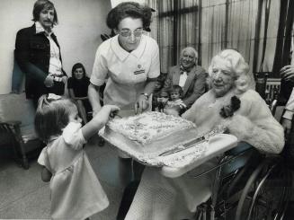 Celebrating her 100th birthday yesterday, Anne Jackson was given a big pink cake by Carolyn Jackson