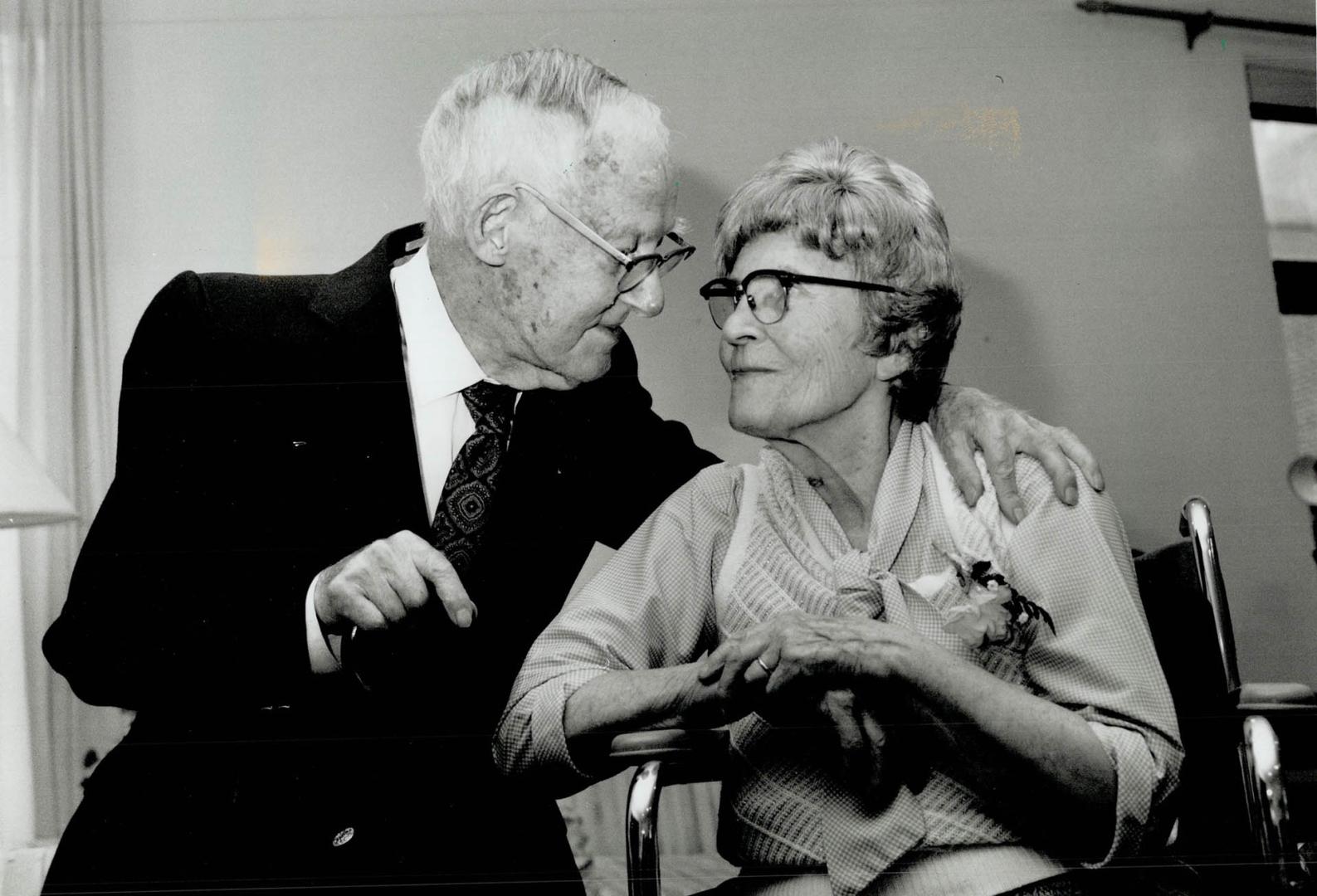 Kisses a century in the making, Theo Lang, 102, prepares to kiss wife Pearl, who celebrated her 100th birthday yesterday at a Toronto nursing home. Th(...)