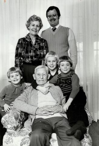 Happy 100, John Kennedy of Willowdale gets happy 100th birthday wishes yesterday from three generations: His daughter Mary Kenney, her son Don, and his sons (from left), Glenn, John and Darren