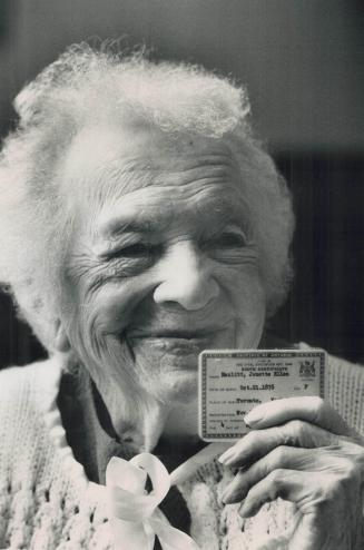 Happy 110th Birthday!, Nellie Thompson, born Jenette Ellen Hazlitt, flashes her birth certificate from 1878, the year Sir John A. Macdonald regained power from Alexander Mackenzie