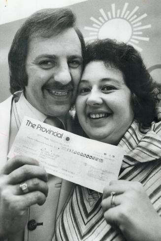 Carol and Richard Rice of Stoney Creek, Provincial lottery $1 million winners hold THE cheque