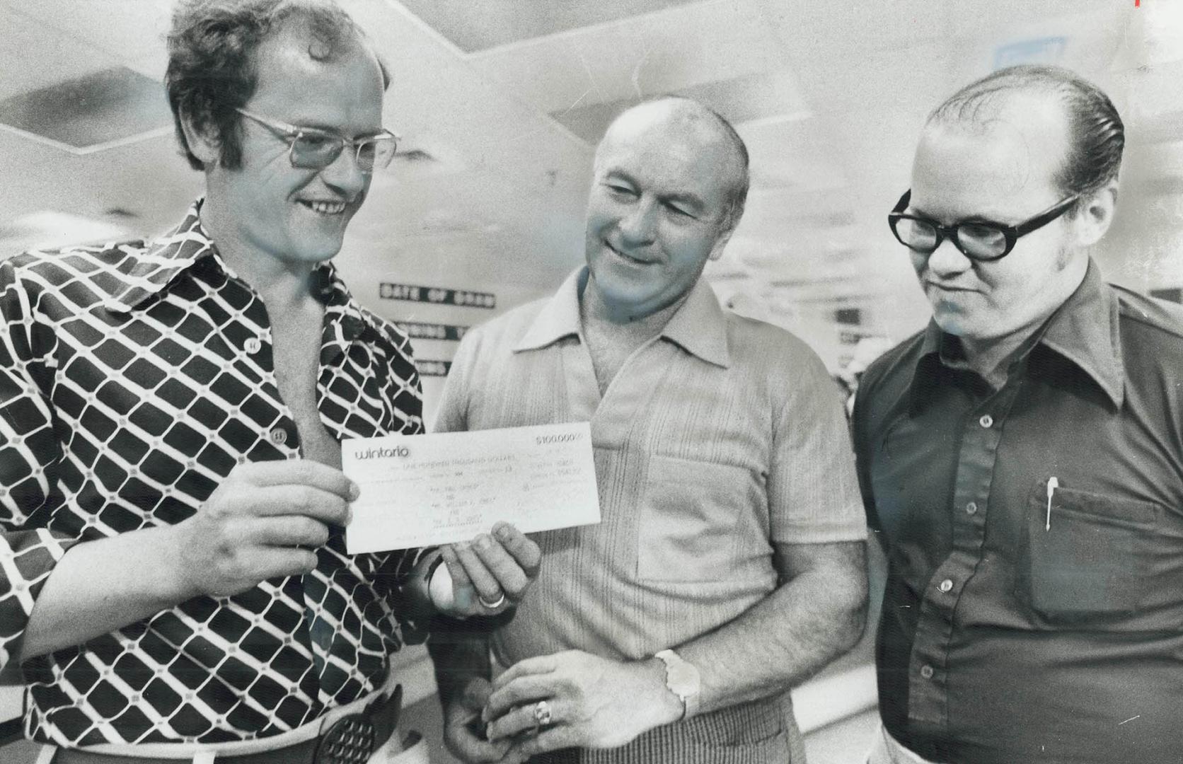 $100,000 winners collect cheque today at the Wintario offices on Bloor St
