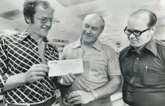 $100,000 winners collect cheque today at the Wintario offices on Bloor St