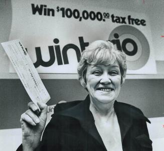 $100,000 win ends money worries, Switchboard operator Helen Rodgers, 60, of Ottawa, flashes cheque for $100,000 she won in Thursday's Wintario lottery