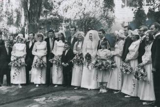 The wedding party consisted of Janet Ruby, maid of honor, Mary Ruby, junior bridesmaid, Joanna Ruby, Victoria Ruby, Anne Smith-Binghan, Judy McWhinney(...)