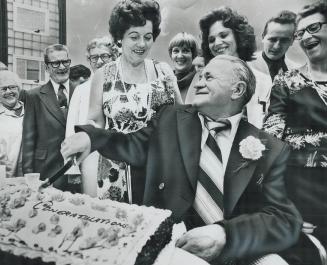 Newlyweds Clyde and Diane Fraser cut cake yesterday at wedding reception in West Park Hospital thrown by friends and hospital staff. He had been a bac(...)