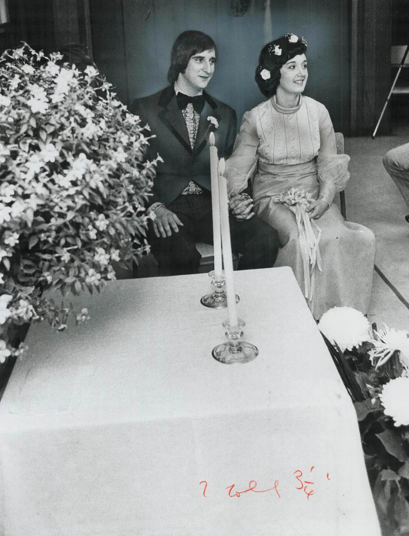 Married by neighborhood plumber, Bill Giesene and Karen Law at their wedding