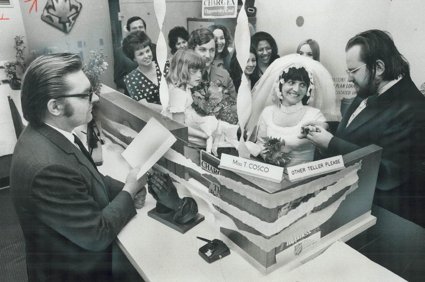 A couple you can bank on, Teresa Cosco marries Lee Heslop of Boston yesterday afternoon in a familiar setting-the Bank of Nova Scotia branch at Cowell(...)