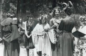Pagan Wedding, Strollers in High Park yesterday encountered a handfasting or pagan wedding between Vivian Power (left) and Ted Merritt, performed by R(...)