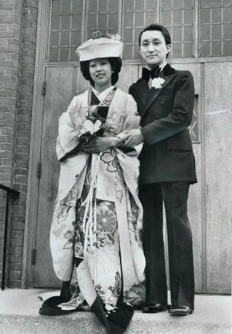 Bride Judy Nakamura wore traditional Japanese wedding robes, including the elaborate wig and veil for her wedding to Dr. John Hayami in St. Alban the (...)