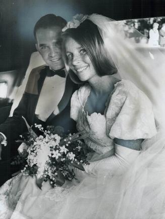 Mary Anne Shoults weds, Capt. And Mrs. Kim Waterhouse are shown after their wedding in Bishop Strachan School chapel. The former Mary Anne Shoults is (...)