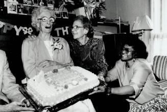 Reason to celebrate: Frances Witton marks her birthday with daughter Mavis Mahaffey and Dewson Private activities director Pearl Orridge