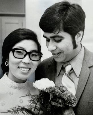 Mr. and Mrs. Avtar Ahlinvalia, The bride is Son Okim of South Korea