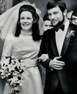 Arne Corsen, who hitchhiked round the world to come to Canada from Germany, and his bride, the former Pamela Mary Tidy, of Toronto, are pictured after(...)