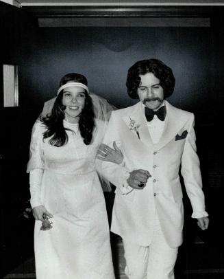 Mr. and Mrs. Kenneth Florence after wedding last night, Bride is the former Simone Creed, eldest daughter of Mr. and Mrs. Eddie Creed